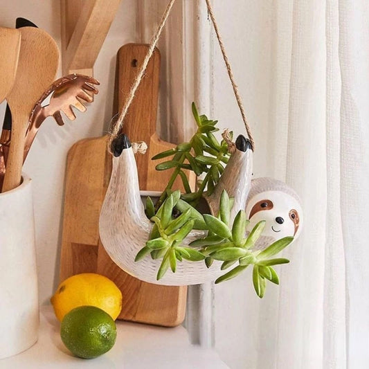 Seravia - Unik Håndlavet Keramisk Blomsterpotte med Charmerende Dovendyr Design