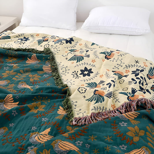 Vendbar bomuldsplaid med blomst- og fuglemønster – Grøn Sleepy Choice i 150x200 cm eller 200x230 cm