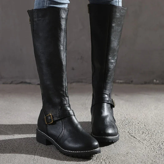 Elegant women's knee-high boots with stylish buckle details