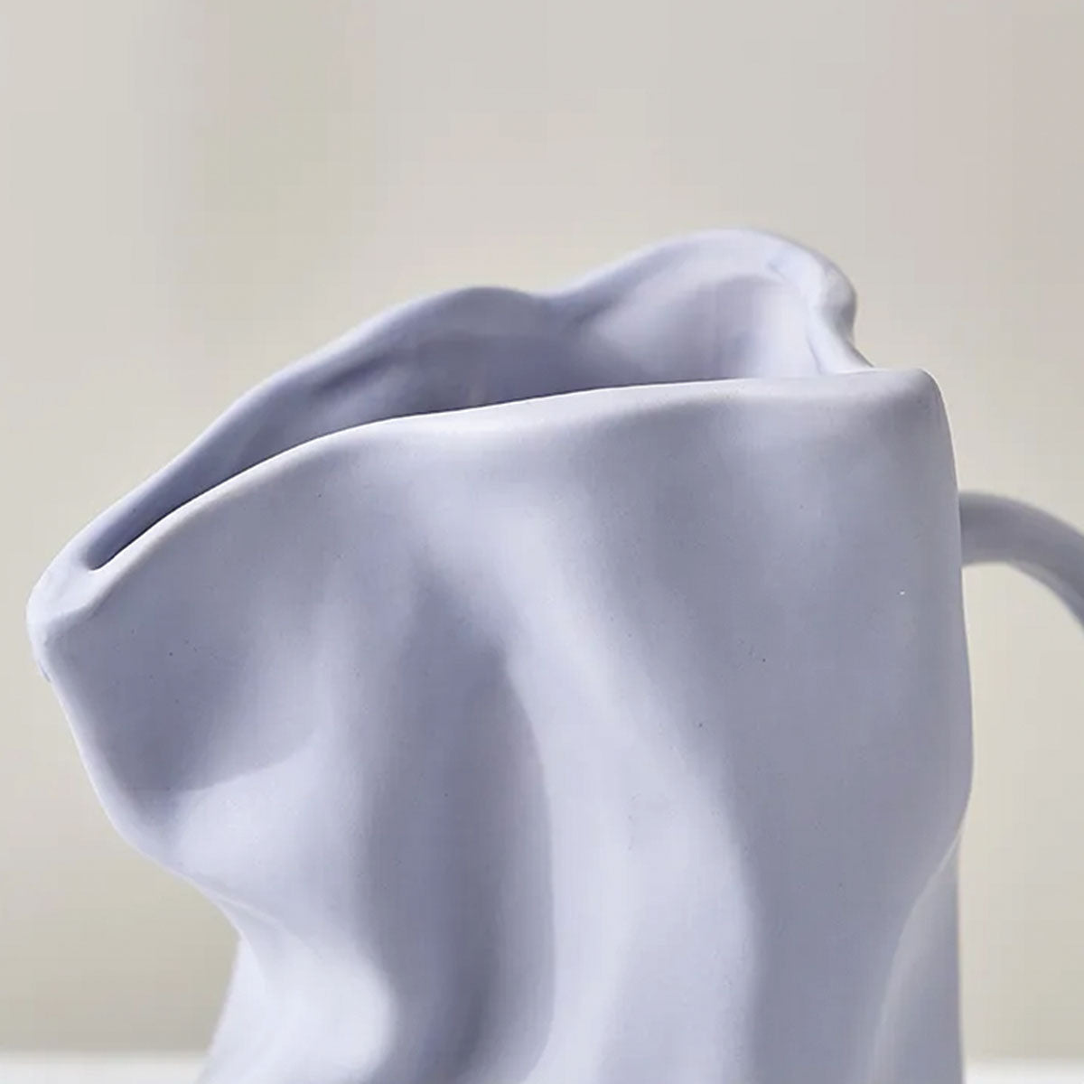 Foldet kaffekopvase